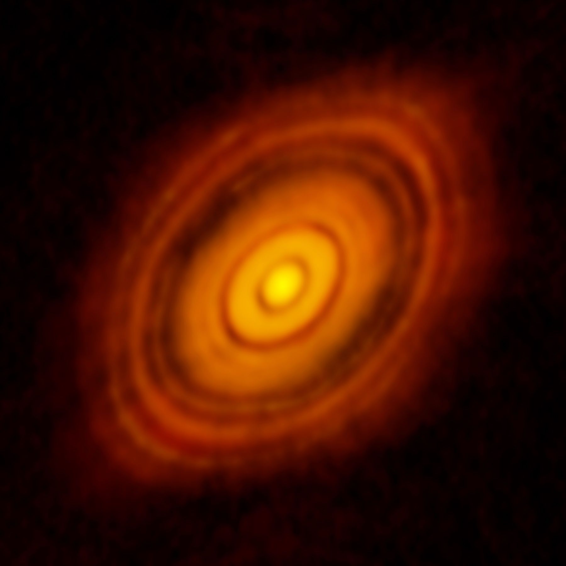 The protoplanetary disk around HL Tau, imaged using the Atacama Large Millimeter Array. Credit: ALMA(ESO/NAOJ/NRAO); C. Brogan, B. Saxton (NRAO/AUI/NSF)