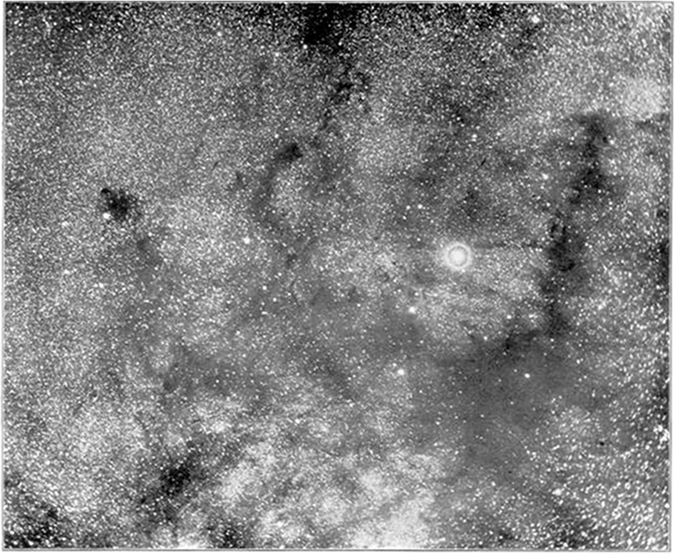 Photograph by E.E. Barnard of the dark structures near the Theta Ophiuchi (bright star w/ diffraction ring) Credit: Ryden and Pogge, Figure 6.1. Originally Barnard 1899